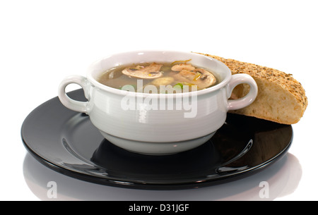 Soupe aux champignons avec morceau de pain Banque D'Images