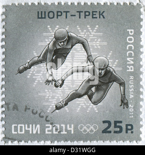 Russie - circa 2011 : timbre imprimé en Russie montre l'image de patinage de vitesse courte piste, vers 2011. Banque D'Images