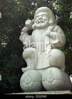 Statue de l'un des sept Daikoku Lucky Dieux Kanda Myojin Sanctuaire Bunkyo-ku Tokyo, Japon Banque D'Images