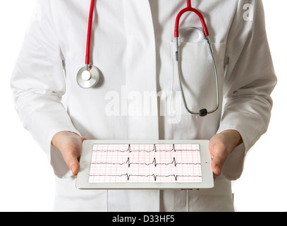 Image symbolique de la médecine. Médecin est à l'aide d'un ordinateur tablette, l'Ipad. Diagramme de l'ECG. Banque D'Images