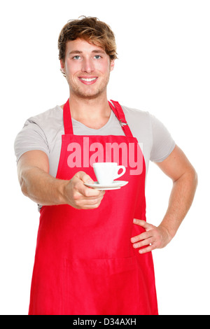 Handsome young small coffee shop business owner in apron serving coffee isolated on white background Banque D'Images