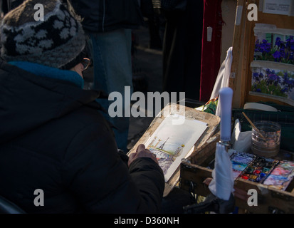 Artiste emmitouflé contre le froid, Montmartre, Paris, France Banque D'Images