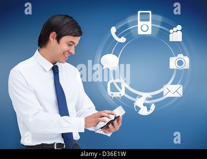 Businessman using tablet avec des applications Banque D'Images