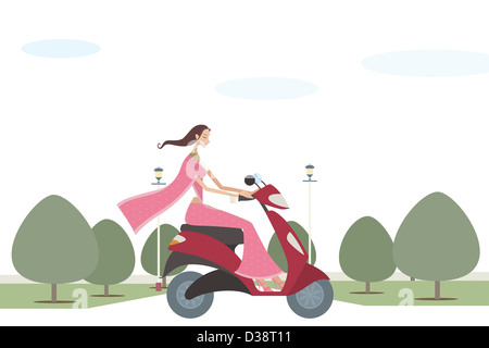 Woman riding a scooter Banque D'Images