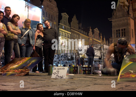 Wroclaw, Pologne, les artistes de rue le soir à la place du marché (Rynek) Banque D'Images