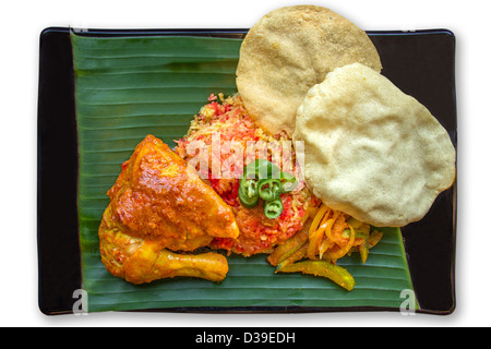 La nourriture traditionnelle indienne Riz Briyani, servi sur des feuilles de banane Banque D'Images