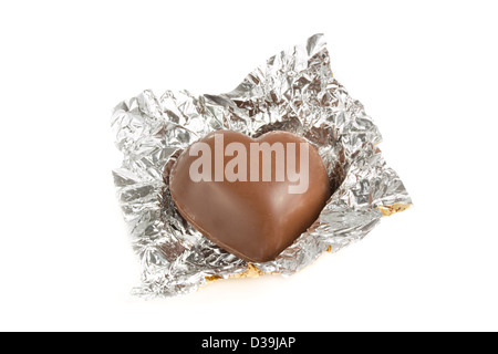 Chocolat en forme de coeur dans un emballage d'aluminium Banque D'Images