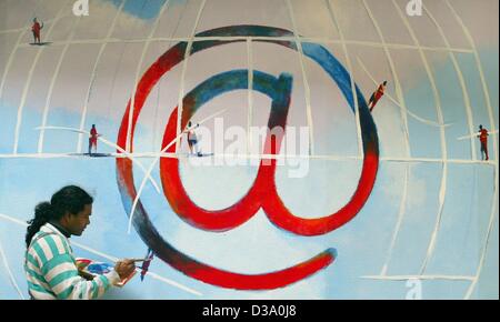 (Afp) - L'artiste a peint une grille universelle autour de l'internet pour @ signe le plus grand salon informatique CeBIT à Hanovre, le 9 mars 2002. Banque D'Images