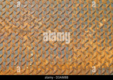 Vieux plancher checker plate acier surface texture caillebotis poignée Banque D'Images