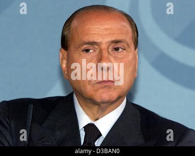 (Afp) - Le Premier ministre italien Silvio Berlusconi, en photo lors d'une conférence de presse à Berlin, le 19 novembre 2002. Banque D'Images