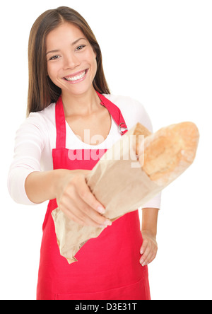 Portrait of beautiful mixed race caucasienne / Asian Woman, commis en donnant du pain à client isolé sur fond blanc Banque D'Images