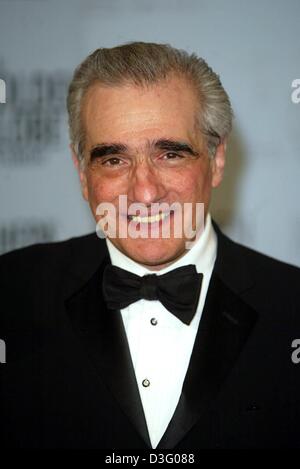 (Afp) - le réalisateur américain Martin Scorsese sourire après le 60e Golden Globe Awards show à Los Angeles, 19 janvier 2003. Son film "Gangs of New York' a reçu le prix de Meilleur film dramatique. Banque D'Images