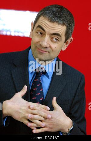 (Afp) - Le comédien britannique Rowan Atkinson ('Mr Bean'), représenté à Berlin, 24 mars 2003. Il est venu à Berlin pour présenter son nouveau film, le thriller d'espionnage "spoof Johnny English'. Banque D'Images