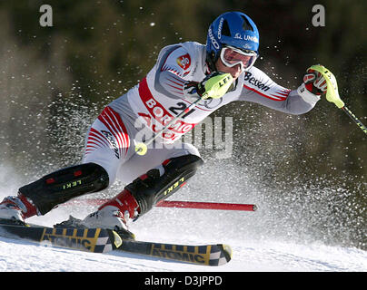 (Afp) - Le skieur Autrichien Benjamin Raich courses descente pendant le premier passage dans l'au combiné aux Championnats du Monde de Ski Alpin à Bormio, Italie, 03 février 2005. Banque D'Images