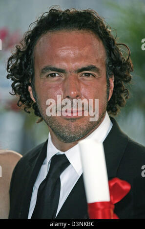 Le réalisateur mexicain Alejandro Gonzalez Inarritu, le gagnant du prix du meilleur réalisateur, pose au photocall du festival lauréats lors de la 59e Festival de Cannes, France, 28 mai 2005. Photo : Hubert Boesl. Banque D'Images