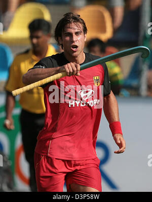 Joueur de hockey sur le terrain national allemand Christopher Zeller célèbre sa victoire 1-0 lors de la Coupe du monde de hockey 2006 groupe B avant-match Allemagne contre l'Inde à Moenchengladbach, Allemagne, mercredi, 06 septembre 2006. Photo : Achim Scheidemann Banque D'Images