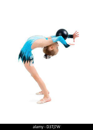 Balle de gymnastique . jeune fille doing gymnastics over white Banque D'Images