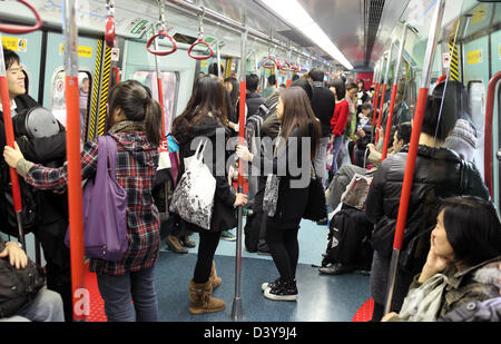 Hong Kong, Chine, des gens dans un métro Banque D'Images