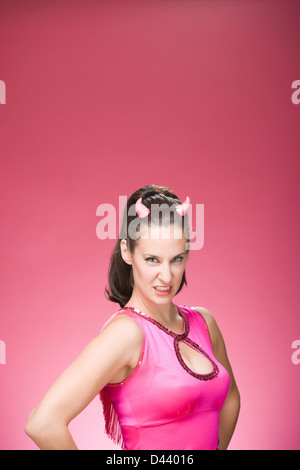 Portrait of Woman Wearing Devil Horns et Making Faces Banque D'Images