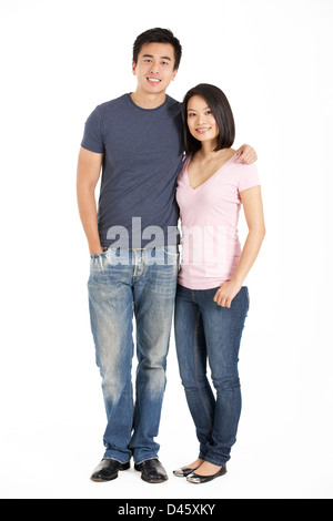 Longueur totale Studio Shot of Couple chinois Banque D'Images