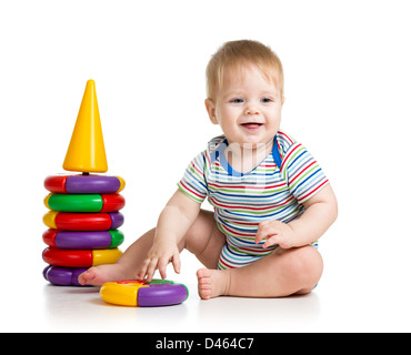 Enfant jouant avec sourire jouet couleur Banque D'Images