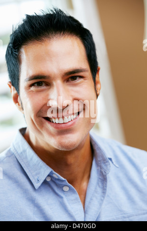Portrait Of Smiling Man At Home Banque D'Images