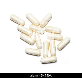 Comprimés de vitamines du groupe cut out fond blanc Banque D'Images