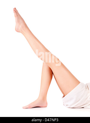 Les jambes de jeune femme, isoler sur fond blanc. Concept de santé Banque D'Images