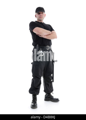 Homme portant de sécurité uniforme noir équipé de police club et des menottes article en toute confiance avec les bras croisés, shot on white Banque D'Images