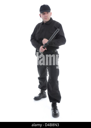Homme portant l'uniforme de la police noir police club fermement tenue dans les deux mains prêt pour l'action,shot on white Banque D'Images