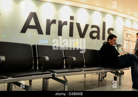 Hall des arrivées dans l'aéroport d'Heathrow Terminal 3 Banque D'Images