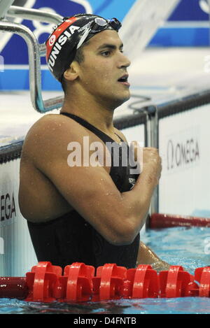 Oussama Melloui jubilates de Tunisie après avoir remporté men's 1500m nage libre dans le Centre national de natation au Jeux Olympiques de Beijing 2008 Beijing, Chine, 17 août 2008. Photo : Bernd Thissen dpa (c) afp - Bildfunk Banque D'Images