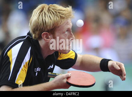 Christian Suess d'Allemagne est en concurrence contre le hongrois Janos Jakab dans le Tennis de table masculin Deuxième tour dans le gymnase de l'Université de Pékin pendant les Jeux Olympiques de Beijing 2008 à Beijing, Chine, 20 août 2008. Photo : Karl-Josef Opim dpa # # # dpa# # #  Banque D'Images