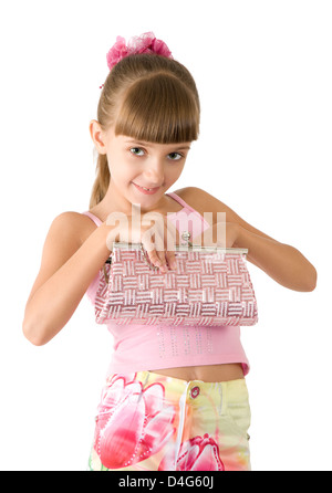 La jeune fille avec un sac à main rose est photographié sur le fond blanc Banque D'Images