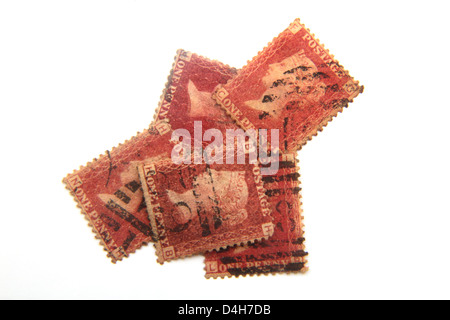 Penny britannique timbres rouge sur un fond blanc. Banque D'Images