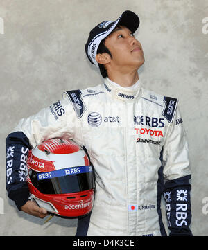 Pilote de Formule 1 Japonais Kazuki Nakajima Williams F1 pose au cours d'une photo à l'Albert Park Circuit dans Melbourne, Australie, 26 mars 2009. L'Australian Grand Prix de Formule 1 aura lieu le 29 mars pour lancer la nouvelle saison. Photo : PETER STEFFEN Banque D'Images