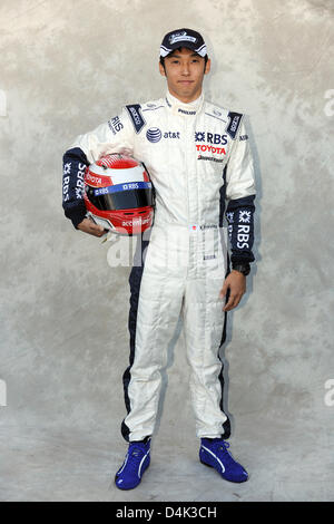 Pilote de Formule 1 Japonais Kazuki Nakajima Williams F1 pose au cours d'une photo à l'Albert Park Circuit dans Melbourne, Australie, 26 mars 2009. L'Australian Grand Prix de Formule 1 aura lieu le 29 mars pour lancer la nouvelle saison. Photo : PETER STEFFEN Banque D'Images