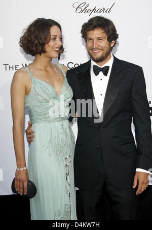 Acteurs Français Guillaume Canet et Marion Cotillard assister au gala de l'amfAR contre le sida au cours de la 62e édition du Festival de Cannes à Cannes, France, 21 mai 2009. Photo : Hubert Boesl Banque D'Images