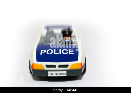 Voiture de police jouet en plastique service concept d'urgence Banque D'Images