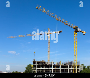 Travailler sur une surface de bâtiment Banque D'Images