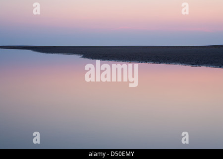 L'Angleterre ; NORFOLK HOLKHAM ; résumé ; SEASCAPE ; COUCHER DU SOLEIL SUR LA MER ; plage ; Banque D'Images