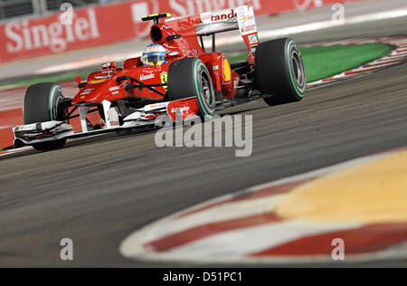 Pilote de Formule 1 espagnol Fernando Alonso, de l'écurie Ferrari en action lors de la Grand Prix de Singapour à la Marina Bay Street Circuit dans Singapour, 26 septembre 2010. Photo : Jan Woitas Banque D'Images