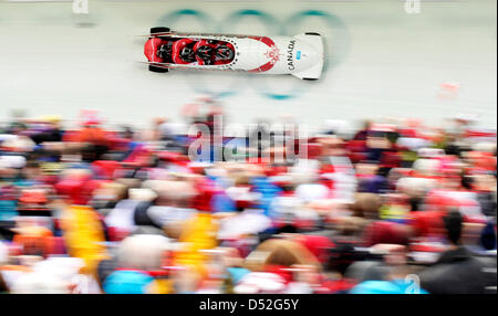 (L'avant à l'arrière) Lyndon Rush, Chris Le Bihan, David Bissett et Lascelles Brown du Canada 1 équipe en action au cours de la chaleur 4 Men's Four-Man Bobsleigh la concurrence au centre de glisse de Whistler durant les Jeux Olympiques de 2010 à Vancouver à Whistler, Canada 27 février 2010. Photo : Peter Kneffel Banque D'Images