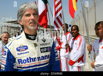 L'ancien champion du monde de Formule 1 Damon Hill, vu en marge du Grand Prix de Bahreïn à la piste de course de Sakhir, à Bahreïn, le 14 mars 2010. Photo : Jens Buettner Banque D'Images