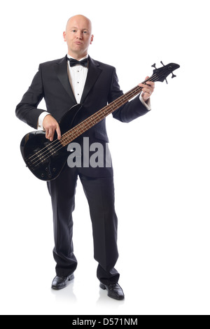 L'homme en smoking jouant de la guitare basse isolated on white Banque D'Images