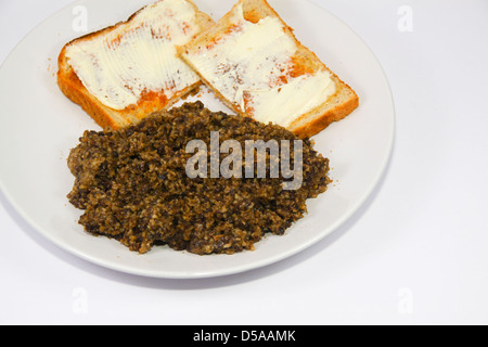 Haggis étamé avec tartines beurrées Banque D'Images