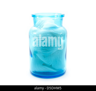cotton pads in blue jar isolated on white background Banque D'Images