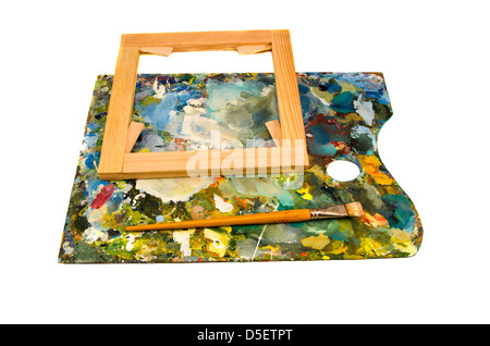 Painters palette avec brosse et cadre du tapis isolated on white Banque D'Images