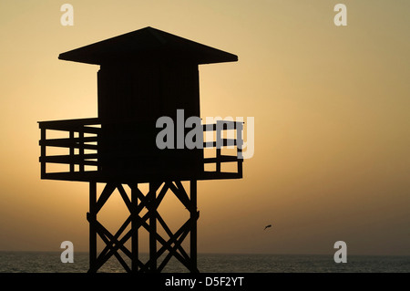 Coucher du soleil sur la plage de Victoria à Cadix, Espagne. © Miguel Gomez Banque D'Images