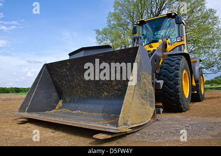 Bulldozer jaune sur un site de construction Banque D'Images